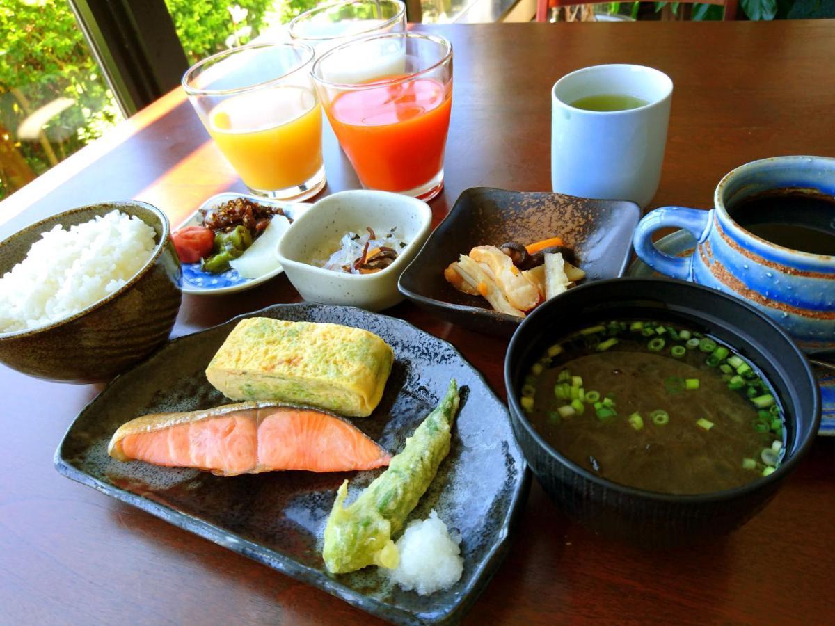 美阿丹海滩酒店 龙乡町 外观 照片
